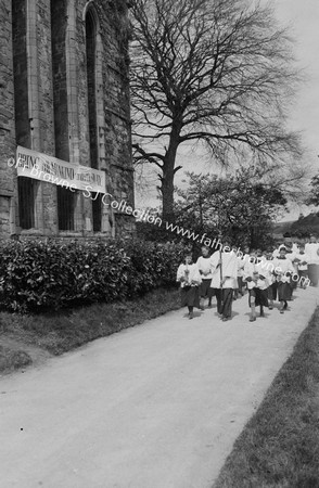 CEREMONY PROCESSION ENTERING GROUNDS